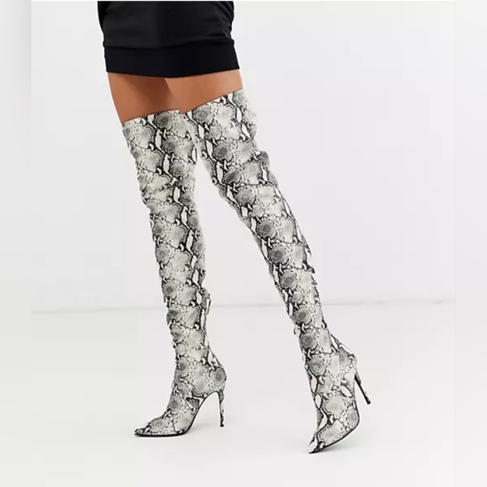 Thigh high snake skin boots